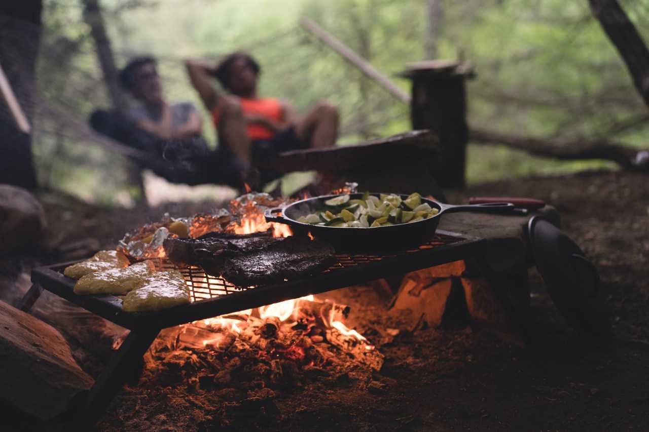 Cooking over a barbecue. Myles Tan/Unsplash