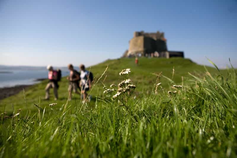 Lindisfarne Castle at the historic Holy Island (Diana Parkhouse on Unsplash)