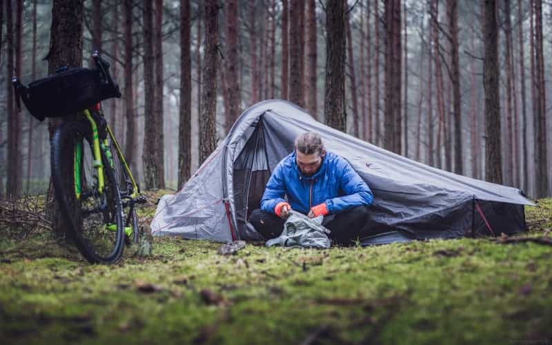 Picking lightweight but waterproof camping kit is vital for wild camping (Marek Piwnicki / Unsplash)