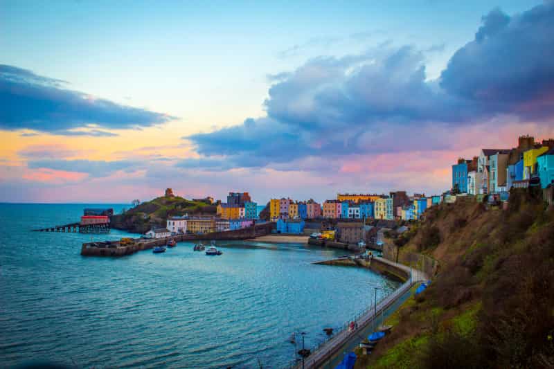 Sunset over the colourful harbour in Tenby (Beata Mitręga on Unsplash)
